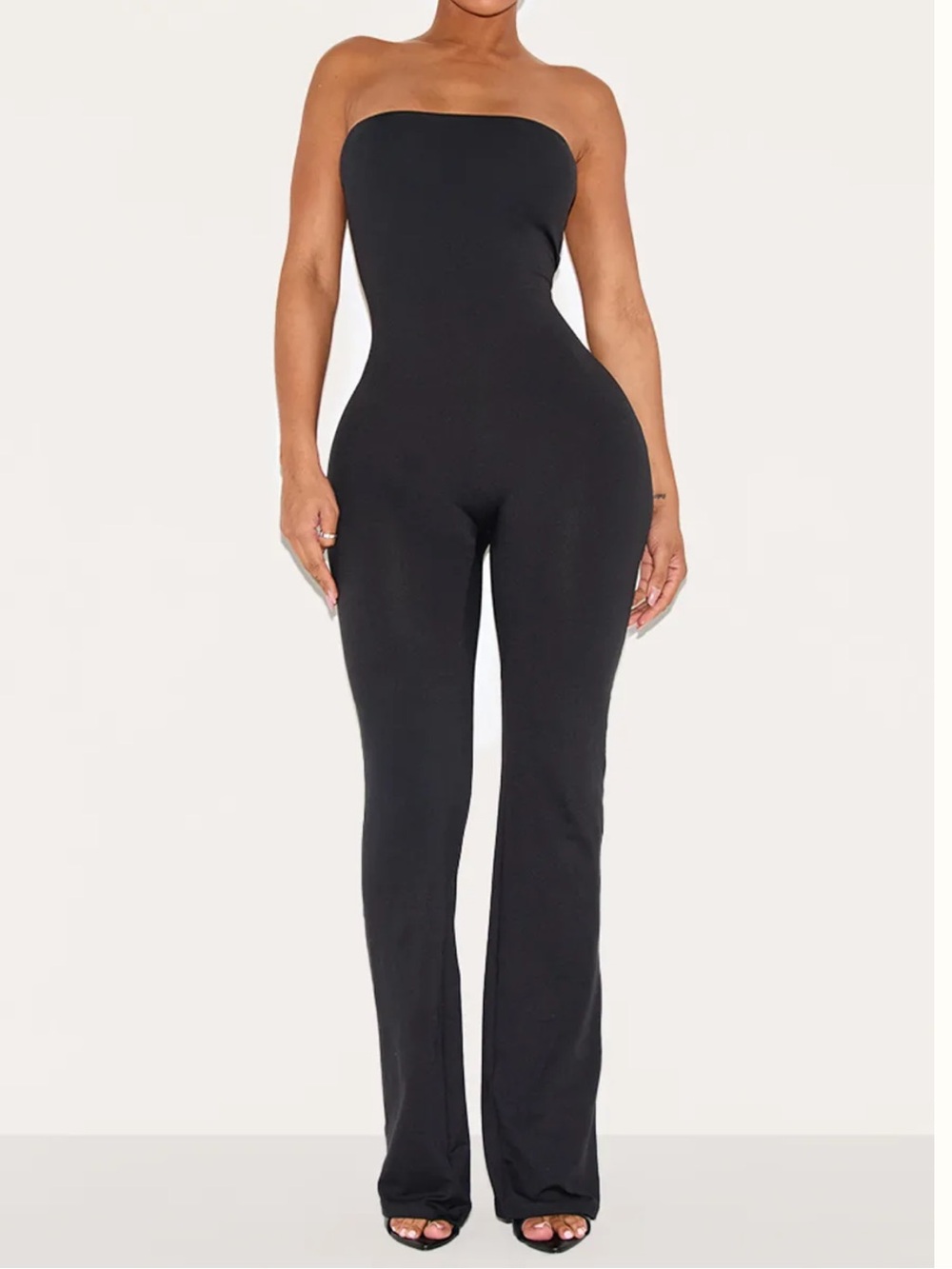 PrettyLittleThing Shape Strapless Tan Flare Jumpsuit